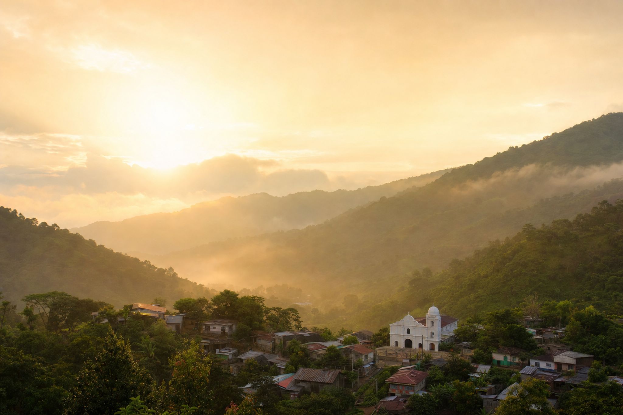 Sunrise over a mountain valley village in Honduras